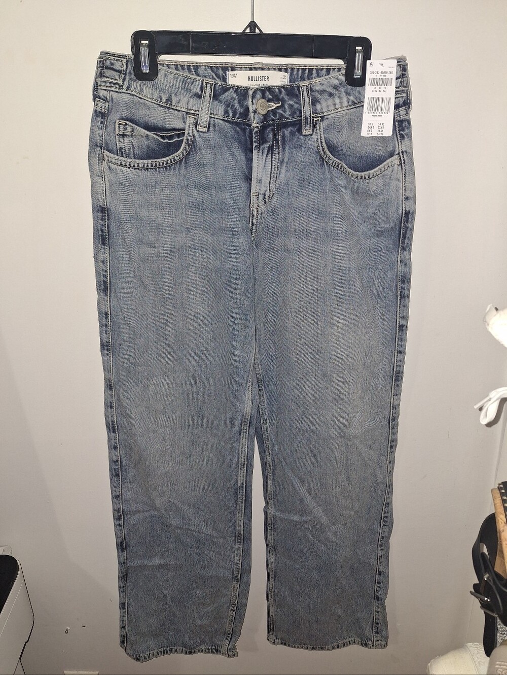Hollister Womens Low Rise Baggy Long Denim Jeans in Light Blue Wash